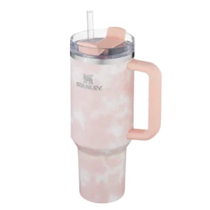 Vaso térmico Stanley de 1200ml en color rosa con diseño marmolado, incluye asa, tapa y sorbete transparente.